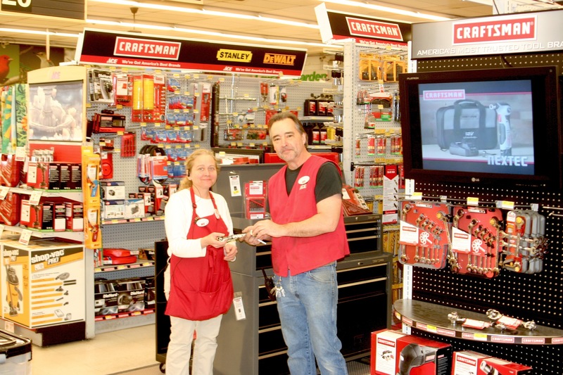 Five Points Best Ace Hardware store managers Sheila Baull and Bruce Jordan display a new Craftsman 9-in-1 wrench called a Dog Bone. Ace stores now carry a variety of Craftsman hand and power tools, all of which have a lifetime guarantee. BY HENRY J. EVANS JR.